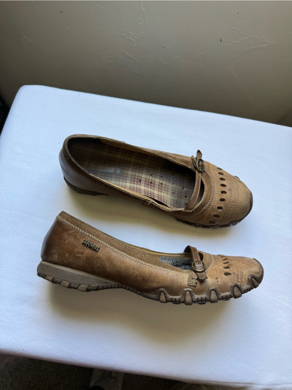 Skechers Mary Jane slip-on shoes, perforated top design and a wedge heel. Size 7